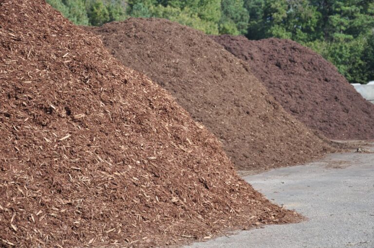 Large Mounds of Different Types of Mulch