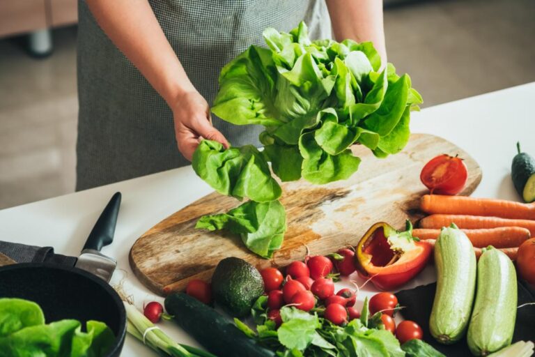 Woman Using Fresh Vegetables From Her Garden for Dinner