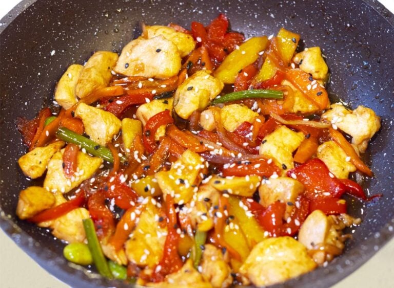 A pan of chicken and vegetables